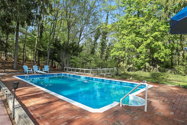 8 Rose Ct, Northport, NY 11768 - view of swimming pool with fence, a fenced in pool, and a patio