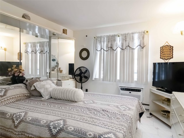 81-56 102nd Rd, Ozone Park, NY 11416 - bedroom with a closet, marble finish floor, a wall unit AC, and baseboard heating