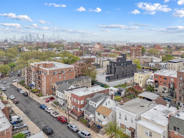 birds eye view of property featuring a view of city