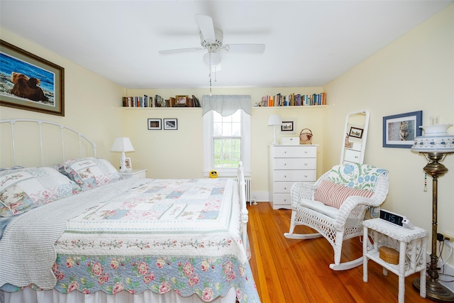 bedroom featuring ceiling fan and wood finished floors