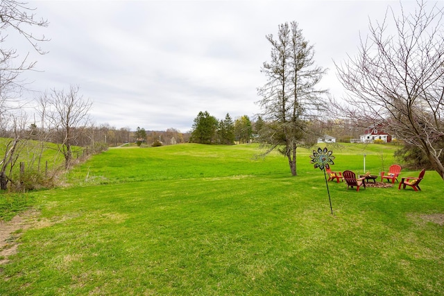 view of yard featuring a fire pit