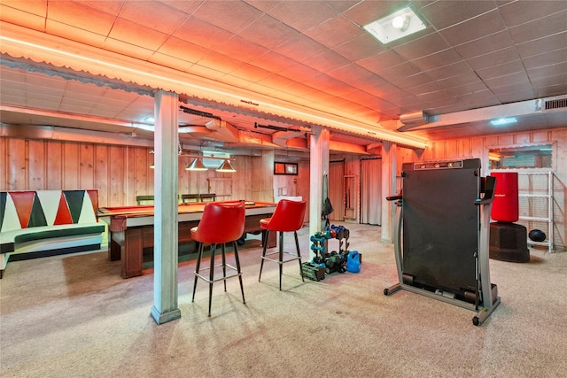 1037 Chestnut St, North Valley Stream, NY 11580 - below grade area featuring carpet and wooden walls