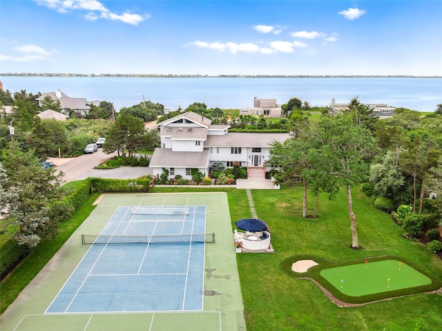 birds eye view of property featuring a water view