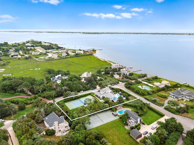 aerial view with a water view and a residential view