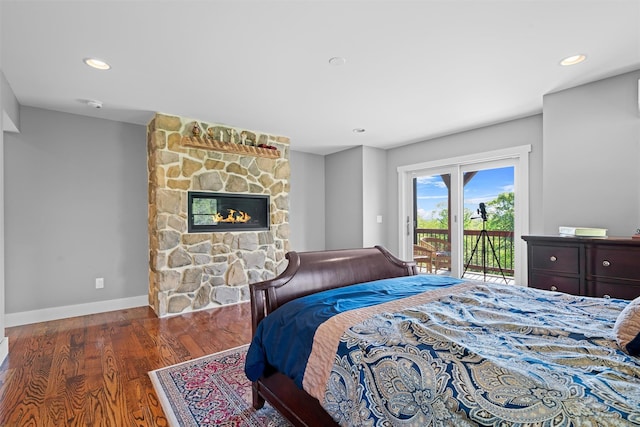 535 County Route 22, Middletown, NY 10940 - bedroom featuring access to exterior, wood finished floors, recessed lighting, a fireplace, and baseboards