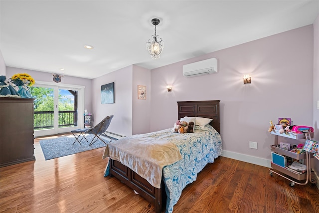 535 County Route 22, Middletown, NY 10940 - bedroom featuring access to outside, a wall unit AC, wood finished floors, baseboards, and recessed lighting