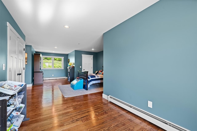 535 County Route 22, Middletown, NY 10940 - living room with a baseboard heating unit, baseboards, wood finished floors, and recessed lighting