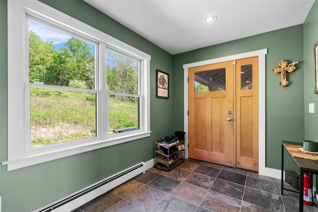 535 County Route 22, Middletown, NY 10940 - entrance foyer featuring a baseboard heating unit, baseboards, dark stone finish flooring, and recessed lighting