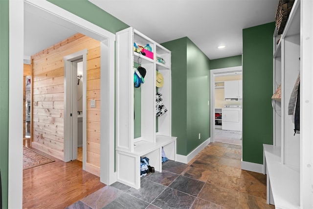 535 County Route 22, Middletown, NY 10940 - mudroom with washer / dryer, wood walls, baseboards, dark stone finish floors, and recessed lighting