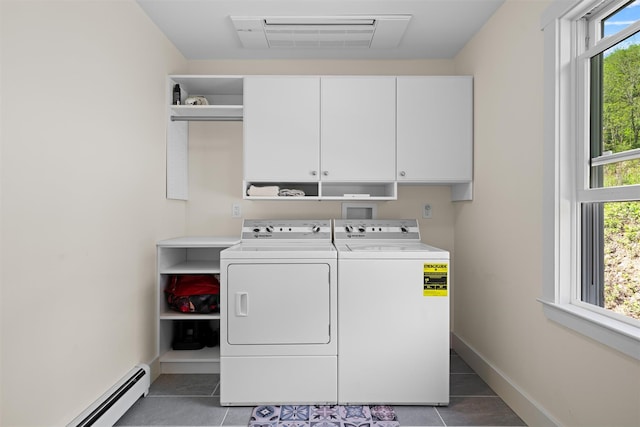 535 County Route 22, Middletown, NY 10940 - laundry area featuring cabinet space, a baseboard heating unit, washing machine and clothes dryer, light tile patterned floors, and baseboards