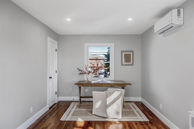 office area with wood finished floors, recessed lighting, baseboards, and a wall unit AC