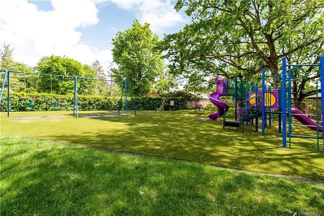 community play area with a yard