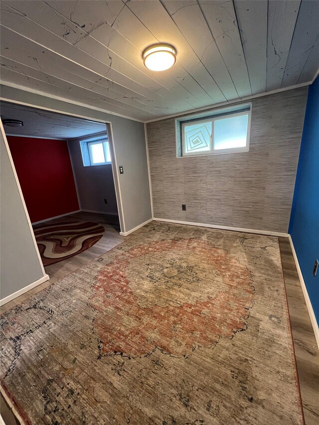 below grade area featuring baseboards