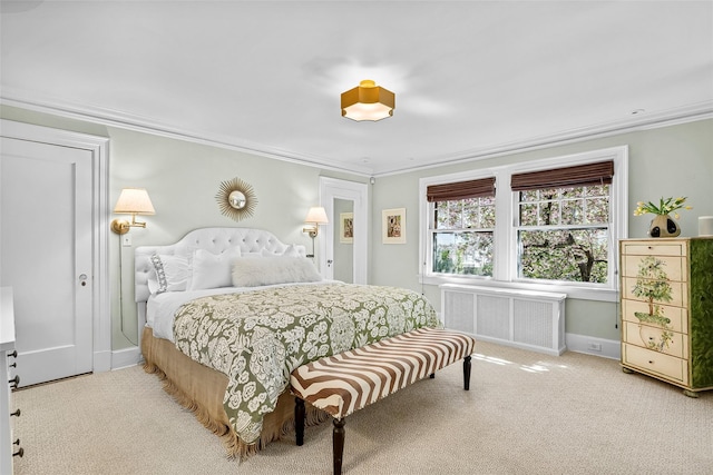 carpeted bedroom featuring crown molding, baseboards, and radiator heating unit