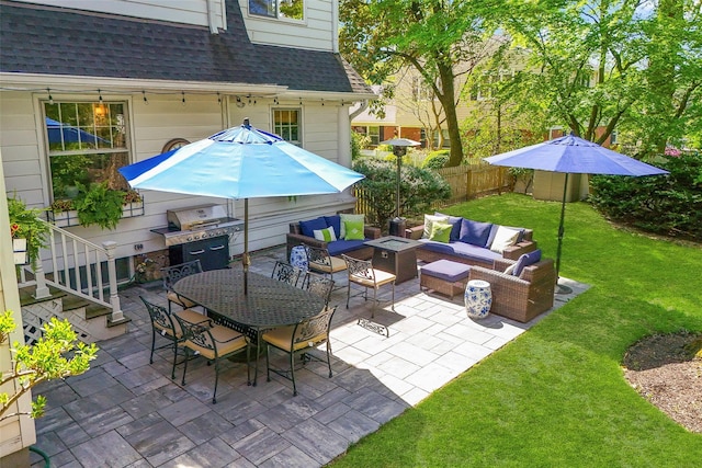 view of patio featuring outdoor dining area, an outdoor living space with a fire pit, area for grilling, and fence