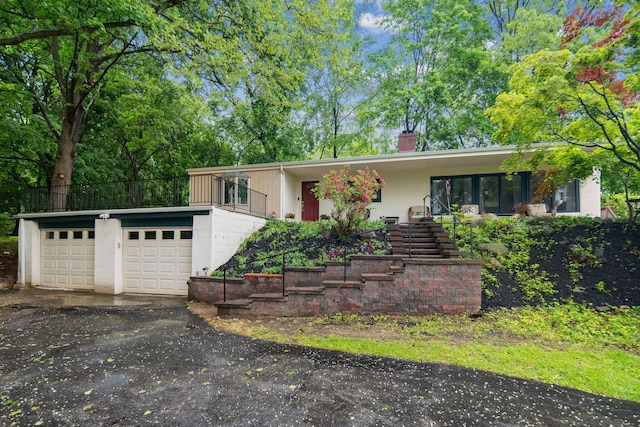 15 Riverview Farm Rd, Ossining, NY 10562 - single story home with a chimney and stairs