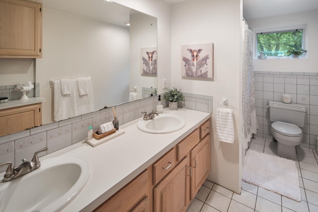 15 Riverview Farm Rd, Ossining, NY 10562 - bathroom featuring tile patterned floors, toilet, tile walls, double vanity, and curtained shower