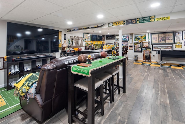 15 Riverview Farm Rd, Ossining, NY 10562 - recreation room featuring a drop ceiling, wood finished floors, and bar area
