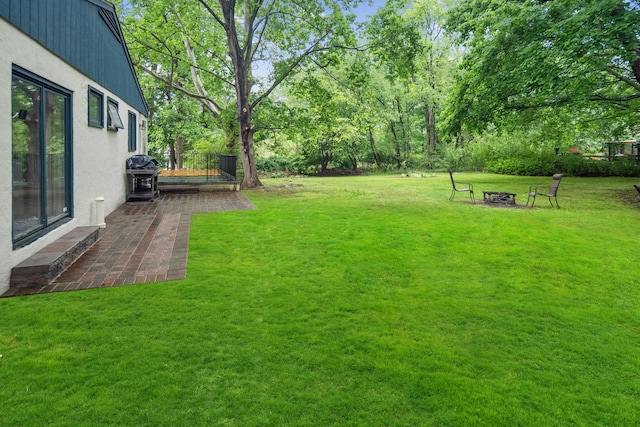 15 Riverview Farm Rd, Ossining, NY 10562 - view of grassy yard featuring a fire pit