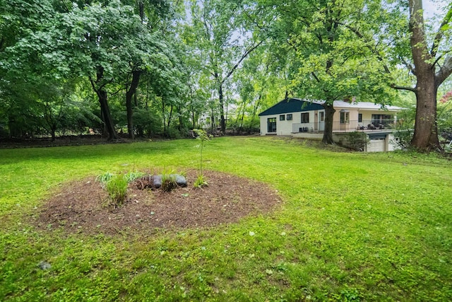 15 Riverview Farm Rd, Ossining, NY 10562 - view of green lawn with an attached garage