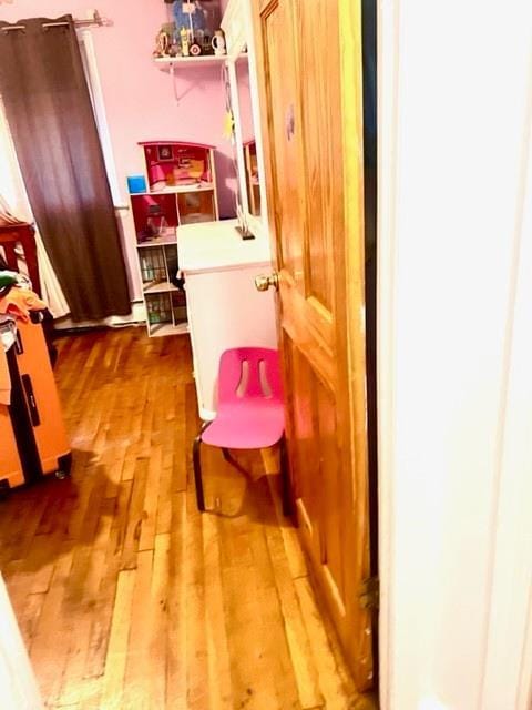3231 Grace Ave, Bronx, NY 10469 - hall featuring wood finished floors
