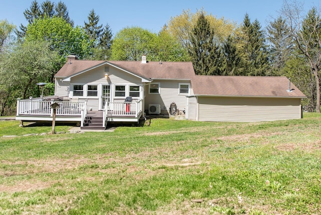 163 Smith Rd, Poughkeepsie, NY 12603 - rear view of property with a shingled roof, a wooden deck, a chimney, and a yard