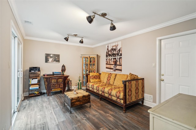 185 Old Pond Ct Unit 185, Jericho, NY 11753 - living room featuring wood finished floors, ornamental molding, track lighting, and baseboards