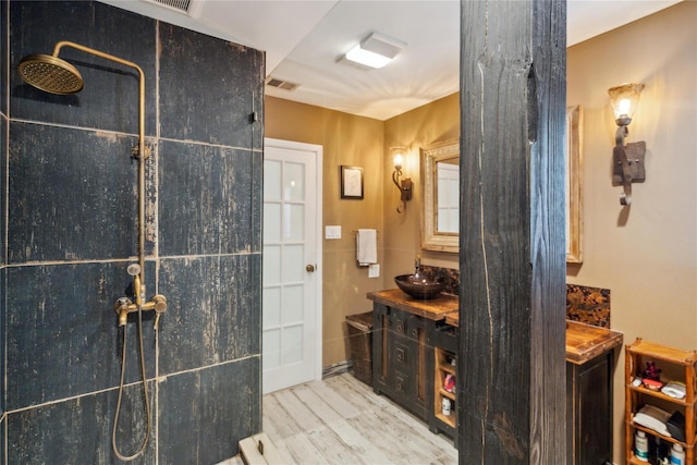 185 Old Pond Ct Unit 185, Jericho, NY 11753 - full bathroom with wood finished floors, a shower, and vanity