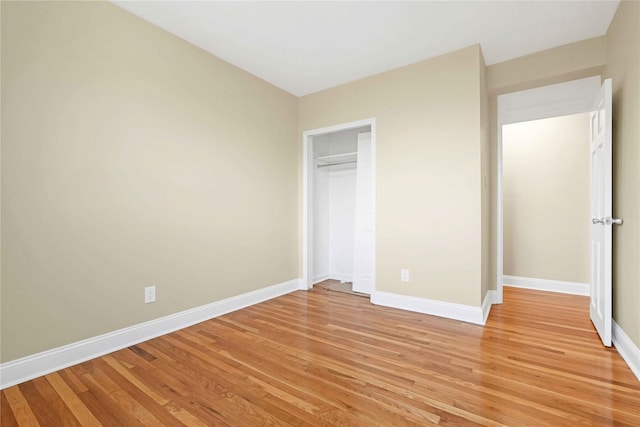 25-40 Union St Unit 6B, Flushing, NY 11354 - unfurnished bedroom featuring baseboards, light wood finished floors, and a closet