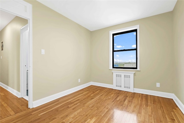 25-40 Union St Unit 6B, Flushing, NY 11354 - unfurnished room featuring baseboards and light wood finished floors