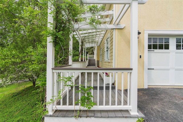 16 Charlotte Dr, Lagrangeville, NY 12540 - wooden deck featuring a garage and a pergola