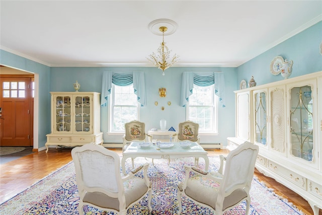16 Charlotte Dr, Lagrangeville, NY 12540 - living area featuring healthy amount of natural light, a baseboard heating unit, crown molding, and baseboards