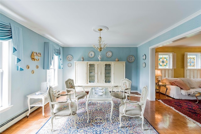 16 Charlotte Dr, Lagrangeville, NY 12540 - living area featuring plenty of natural light, a baseboard heating unit, a chandelier, and crown molding