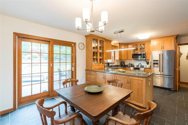16 Charlotte Dr, Lagrangeville, NY 12540 - dining room with a chandelier and dark tile patterned flooring