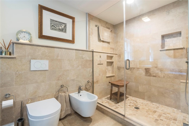 16 Charlotte Dr, Lagrangeville, NY 12540 - full bath featuring a stall shower, tile walls, a bidet, and toilet