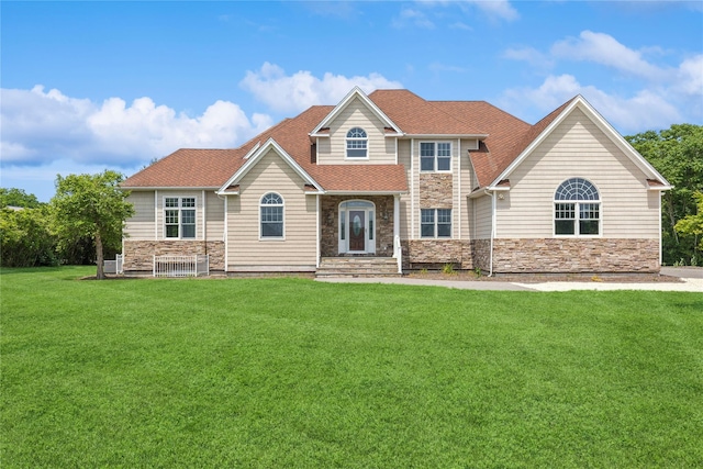 1465 Ackerly Pond Ln, Southold, NY 11971 - view of front of home featuring stone siding and a front yard
