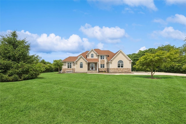 1465 Ackerly Pond Ln, Southold, NY 11971 - view of front of property with stone siding and a front lawn
