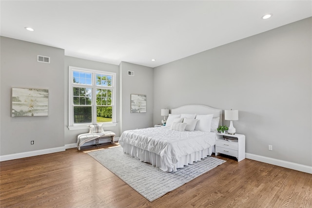 1465 Ackerly Pond Ln, Southold, NY 11971 - bedroom with wood finished floors and recessed lighting