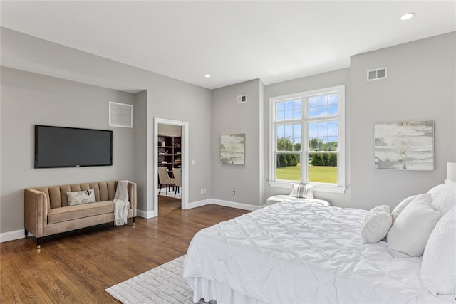 1465 Ackerly Pond Ln, Southold, NY 11971 - bedroom featuring dark wood-style flooring and recessed lighting
