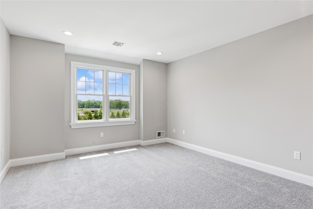 1465 Ackerly Pond Ln, Southold, NY 11971 - carpeted spare room featuring baseboards and recessed lighting