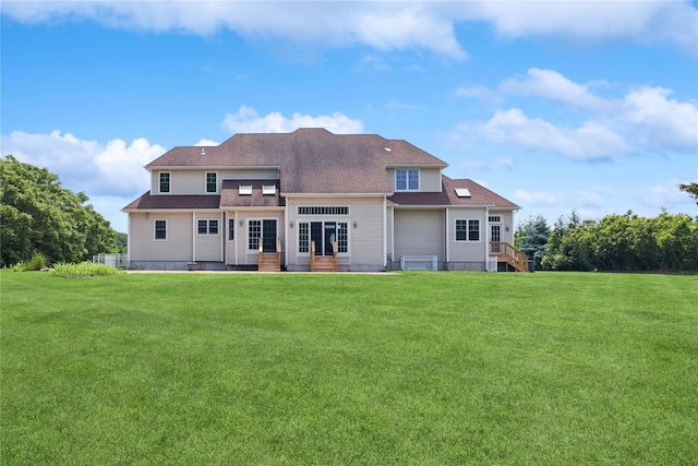 1465 Ackerly Pond Ln, Southold, NY 11971 - rear view of house with entry steps and a yard