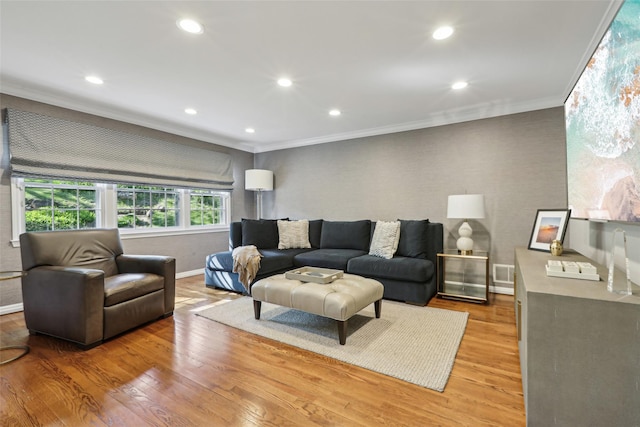 living area with crown molding, baseboards, wood finished floors, and recessed lighting