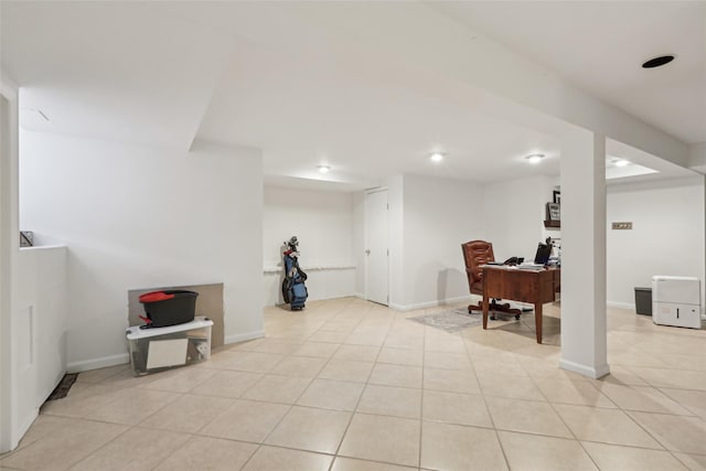 office space featuring recessed lighting, baseboards, and light tile patterned flooring