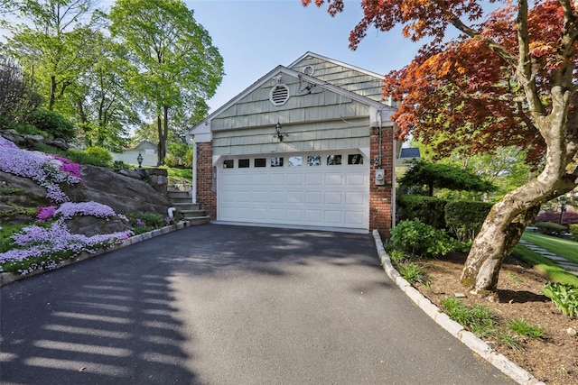 garage with driveway