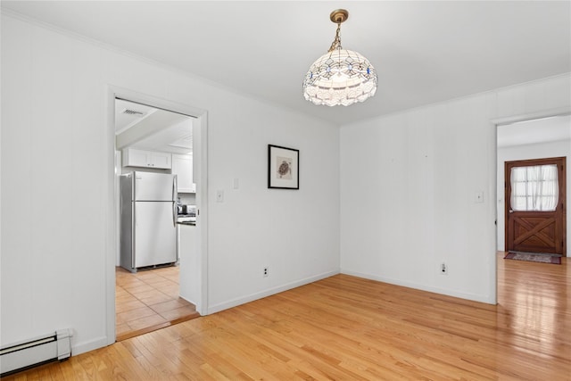 720 Midwood Rd, Cutchogue, NY 11935 - spare room with a baseboard heating unit, light wood finished floors, crown molding, and a chandelier