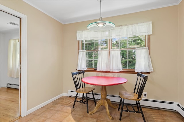 720 Midwood Rd, Cutchogue, NY 11935 - dining space with a baseboard radiator, plenty of natural light, and crown molding