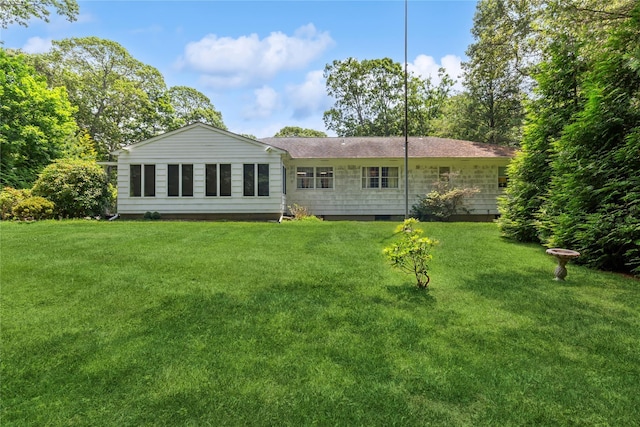 720 Midwood Rd, Cutchogue, NY 11935 - back of house featuring a yard