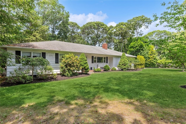 720 Midwood Rd, Cutchogue, NY 11935 - ranch-style home with a chimney and a front yard
