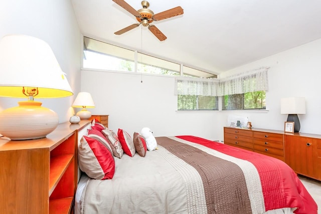 bedroom with lofted ceiling