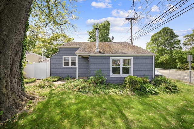 96 Pardee Ave, Islip, NY 11751 - rear view of property with a shingled roof